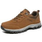 Brown suede leather hiking shoes for men with cushioned sole and lace-up design for outdoor adventures