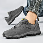 Close-up of gray men's hiking shoes size 46 with breathable mesh and reinforced toe cap for protection