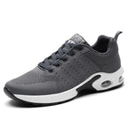 Gray orthopedic athletic sneakers for men with air cushion technology and therapeutic arch support for foot