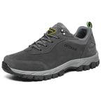 Men's gray outdoor hiking shoes with breathable mesh panels and rubber traction sole for trail walking