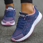 Navy blue and pink mesh running shoes for women with anti-slip sole and breathable construction